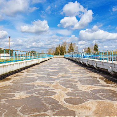 Aeration basins aid in reducing organics that enter the treatment plant from influent waters. Biodegradable organic matter is converted into carbon dioxide and water