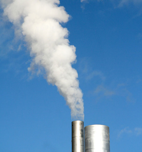 Steam billowing out of a tower.